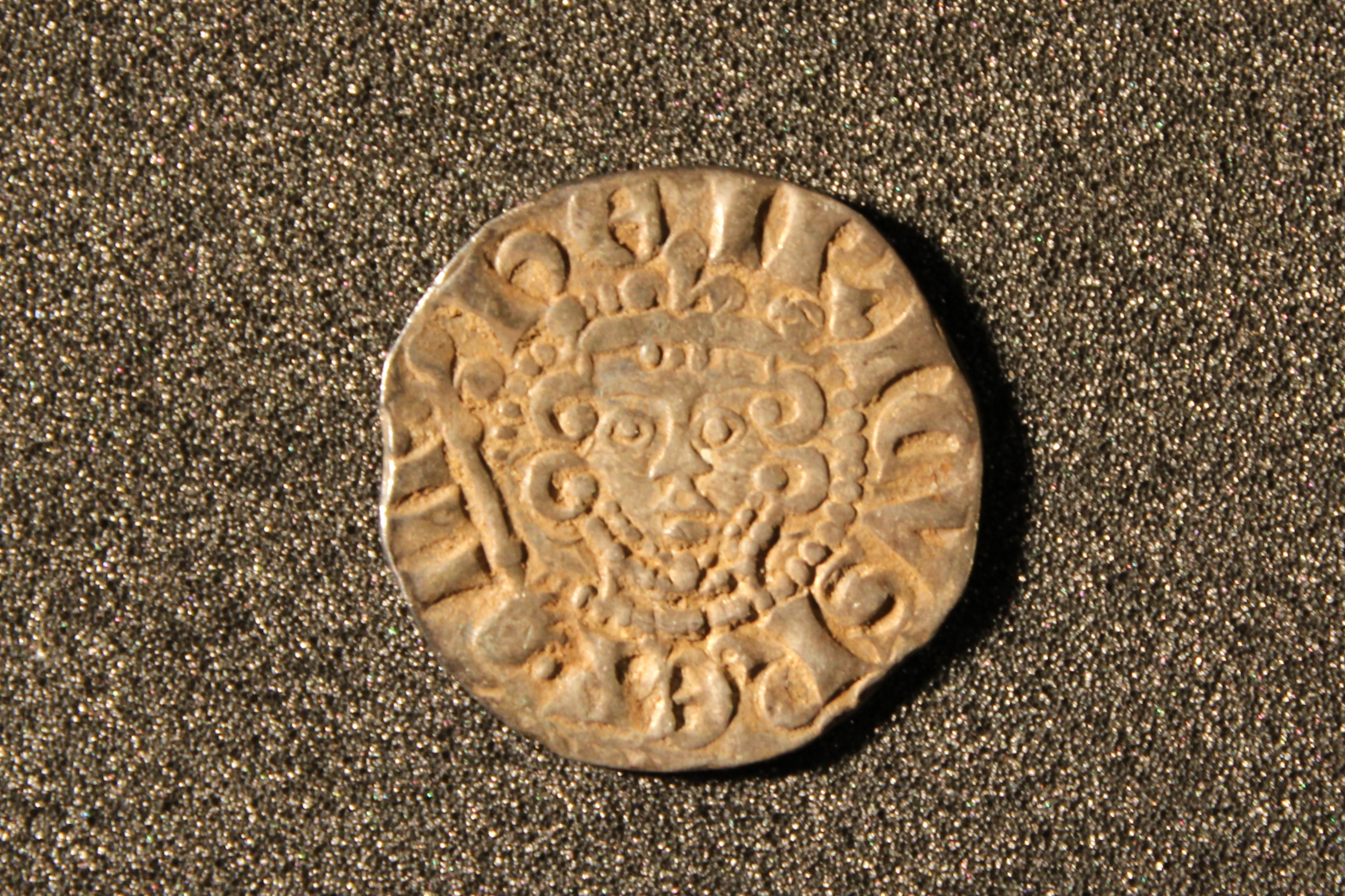 Close-up view of Henry III voided long cross coins from the Hornchurch Hoard